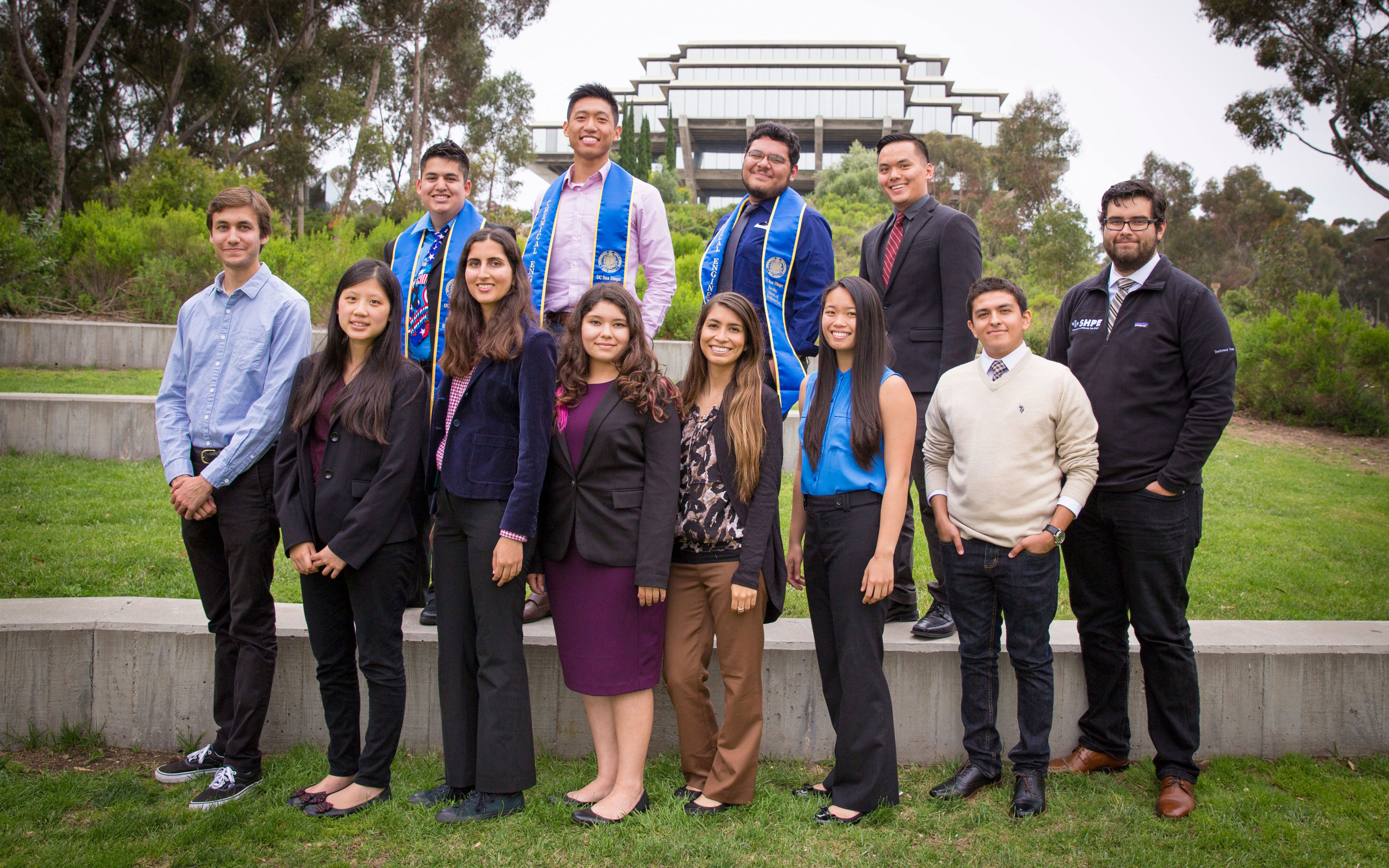 People standing for photo with Geisel Library in background