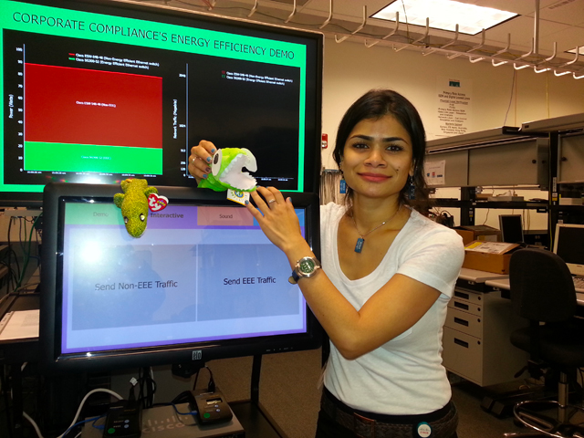 Chaplot stands next to equipment at the UC San Diego Jacobs School of Engineering